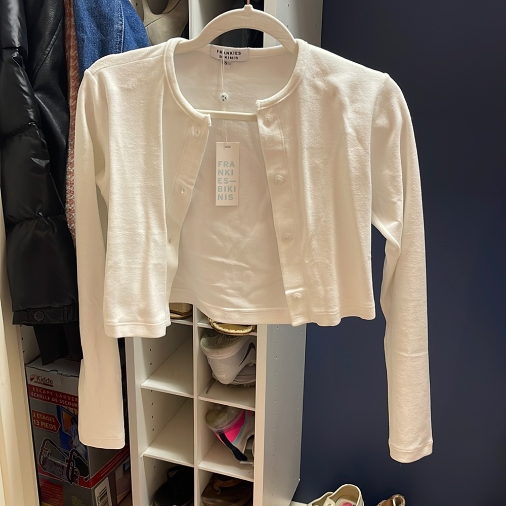 Frankie’s bikinis white button up top and matching skirt!